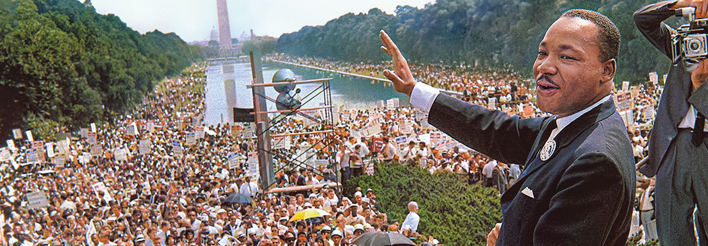Dr. Martin Luther King Jr. speaks to a large crowd at the Washington Monument.