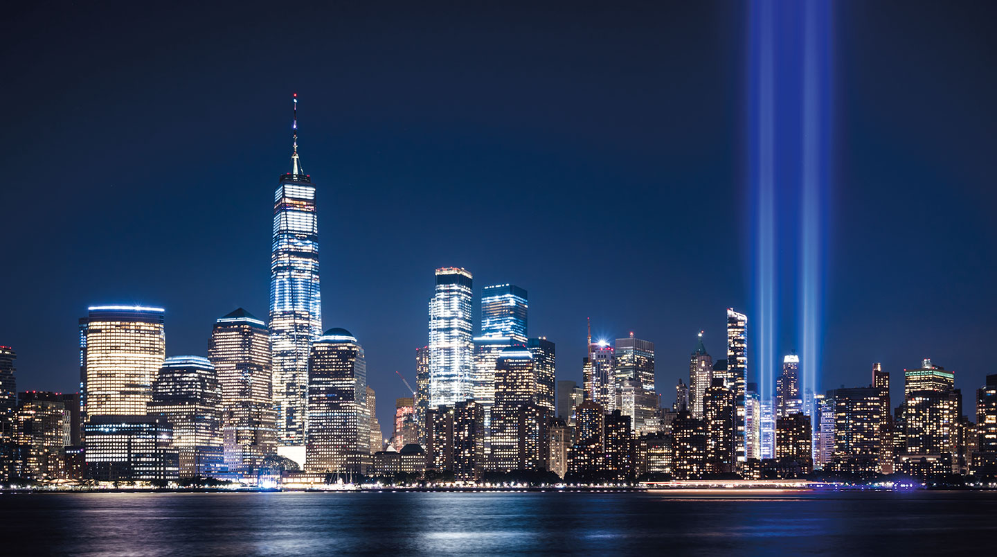 Two bright lights mark the location of where the Twin Towers stood in New York.