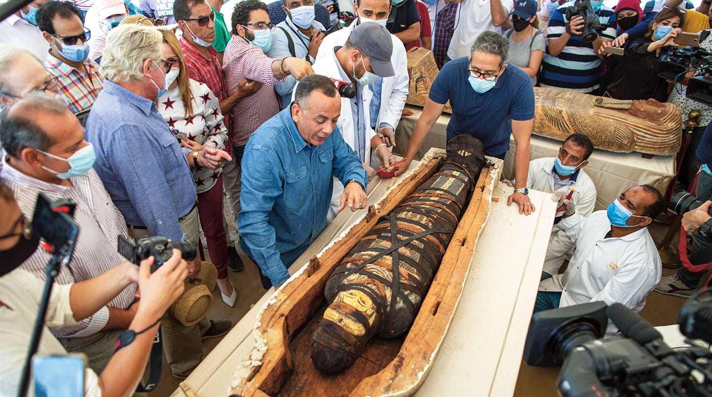 Researchers open an Egyptian Coffin
