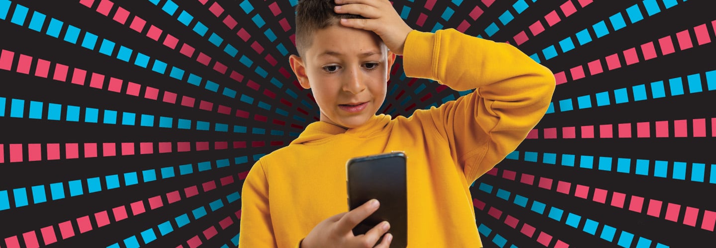 Image of a person using their phone and putting their hand to forehead in concern