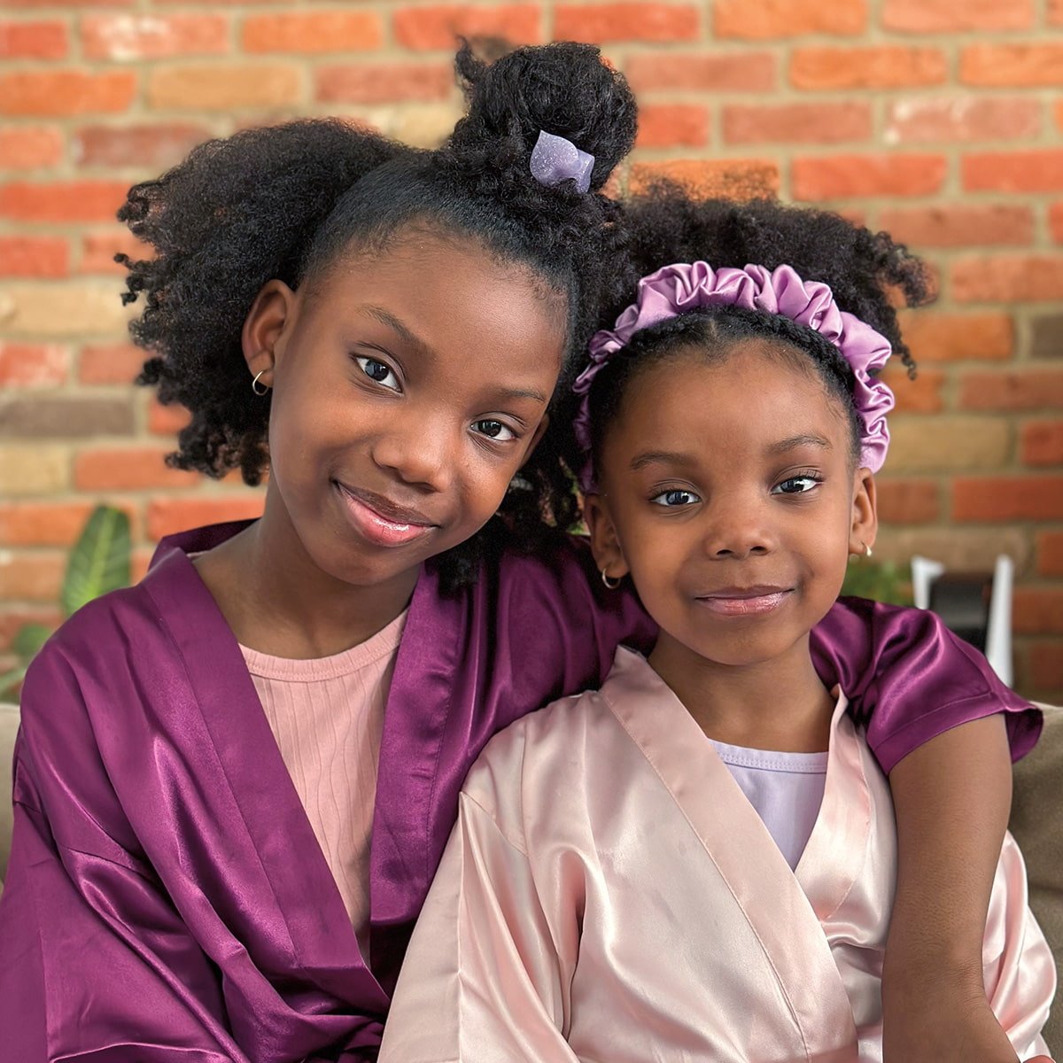 Photograph of Siblings Posing Together · Free Stock Photo