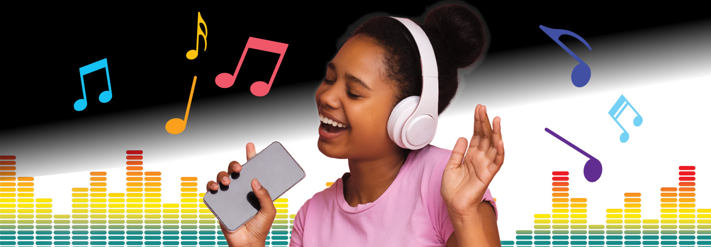 Photo of a kid wearing headphones, holding phone, and dancing