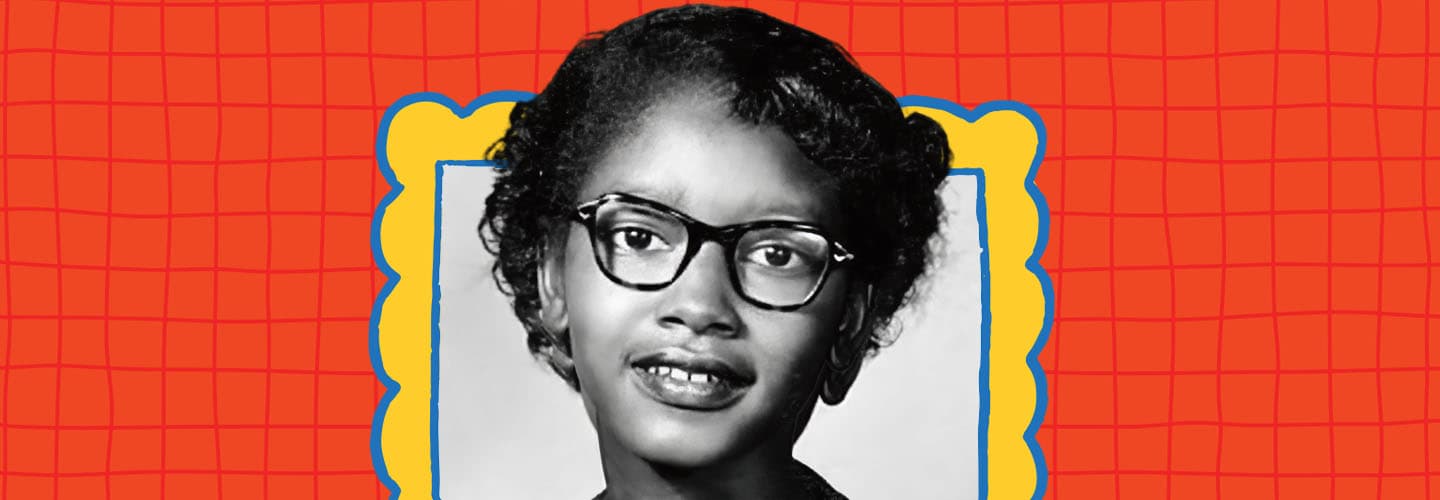 Historical photo of a young girl wearing cat-eye glasses with a yellow and blue decorative border