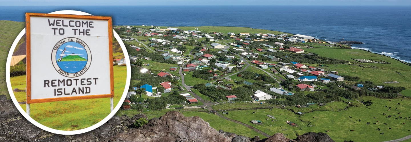 Aerial view of Tristan da Cunha with a sign that reads Welcome to the Remotest Island